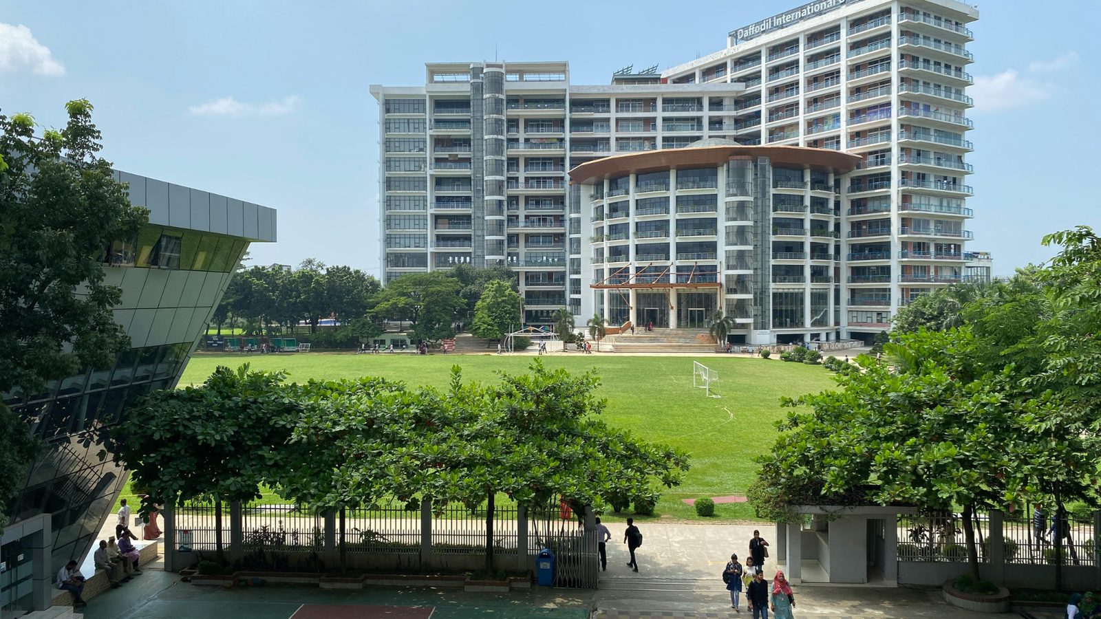 A university campus with the city behind it